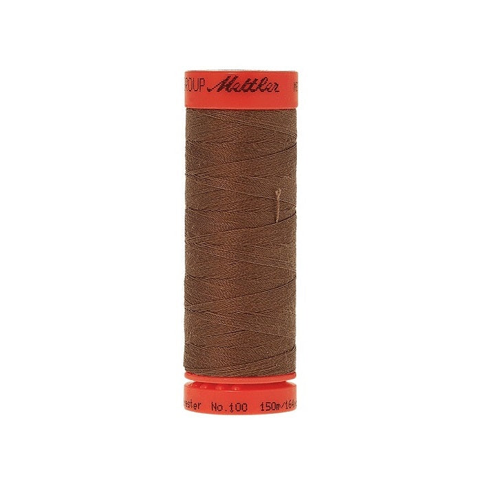 Spool of Mettler 150m mid brown thread.