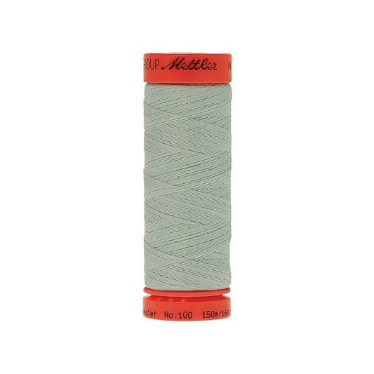 Spool of Mettler 150m light green thread.