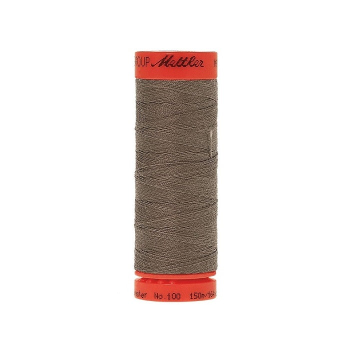 Spool of Mettler 150m brown thread.