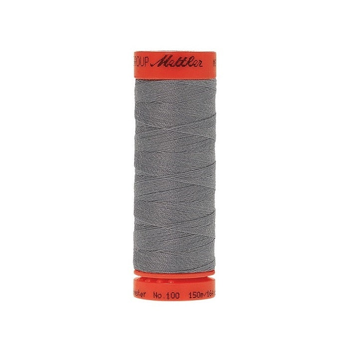 Spool of Mettler 150m grey thread.