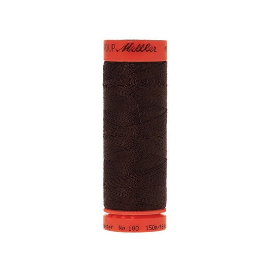 Spool of Mettler 150m dark brown thread.