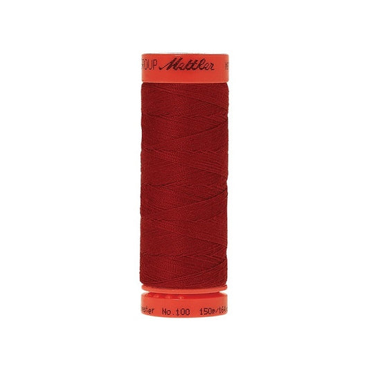 Spool of Mettler 150m dark red thread.