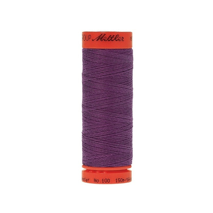Spool of Mettler 150m purple thread.