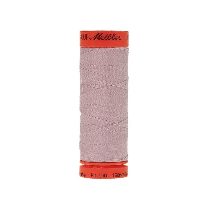 Spool of Mettler 150m light purple thread.