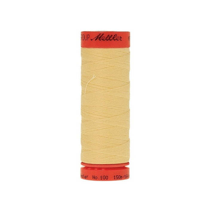 Spool of Mettler 150m yellow thread.