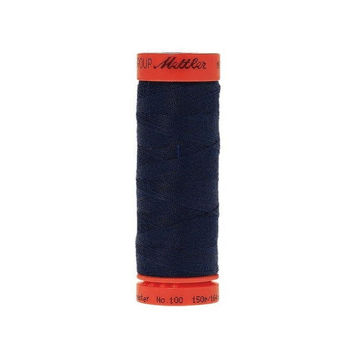 Spool of Mettler 150m dark blue thread.