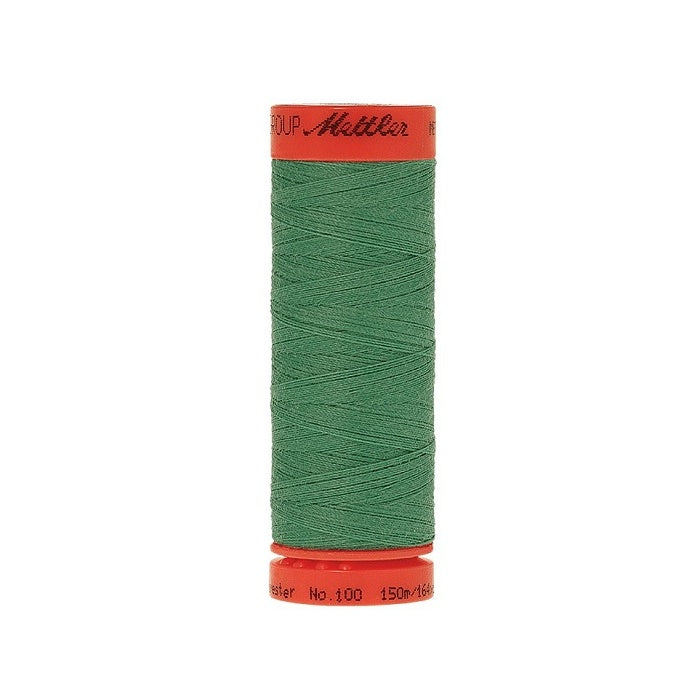 Spool of Mettler 150m green thread.