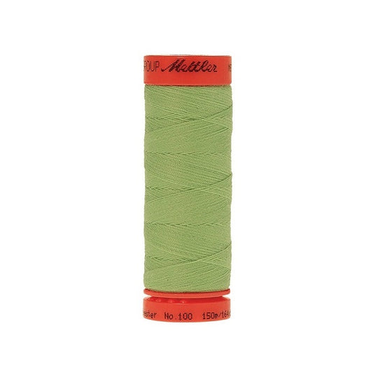 Spool of Mettler 150m mint green thread.