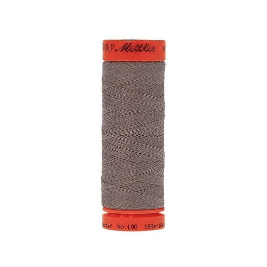 Spool of Mettler 150m grey brown thread.