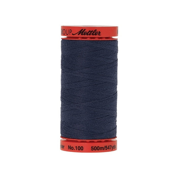 Spool of Mettler 500m navy thread.