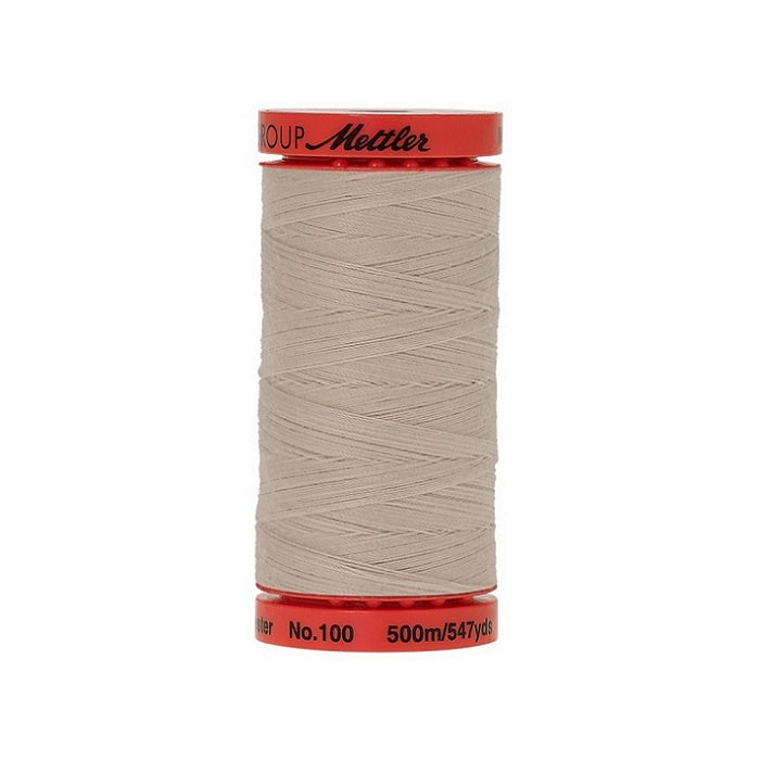 Spool of Mettler 500m light grey thread.