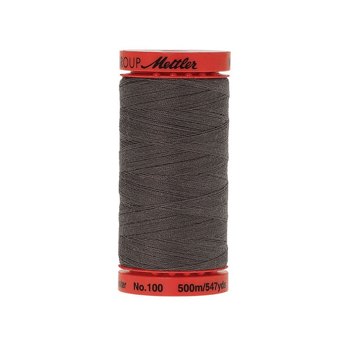 Spool of Mettler 500m dark grey thread.