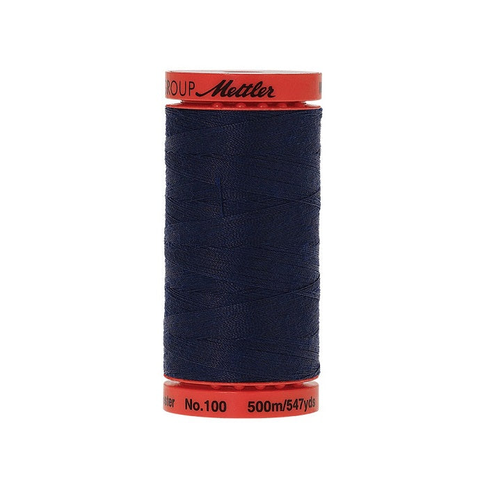 Spool of Mettler 500m navy thread.