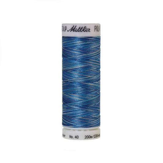 Spool of Mettler blue variegated thread.