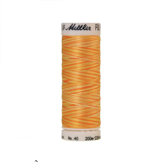 Spool of Mettler orange and yellow variegated thread.