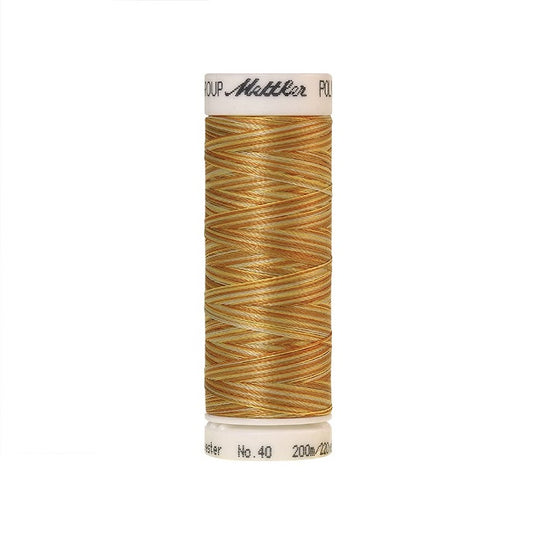 Spool of Mettler gold variegated thread.