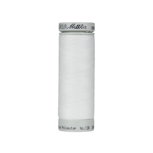 Spool of off white thread with Mettler Seracycle branding.