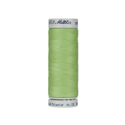 Spool of light green thread with Mettler Seracycle branding.