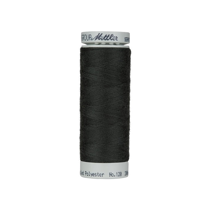Spool of very dark grey thread with Mettler Seracycle branding.