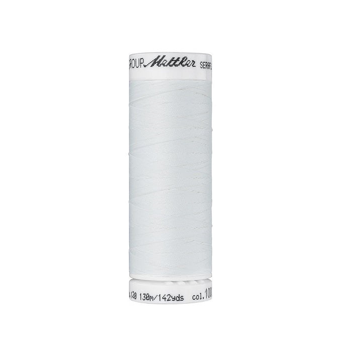 Spool of off white thread with Mettler Seraflex branding.