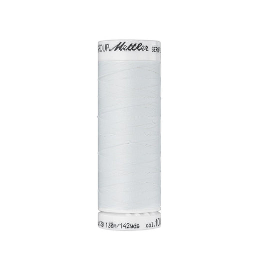 Spool of off white thread with Mettler Seraflex branding.