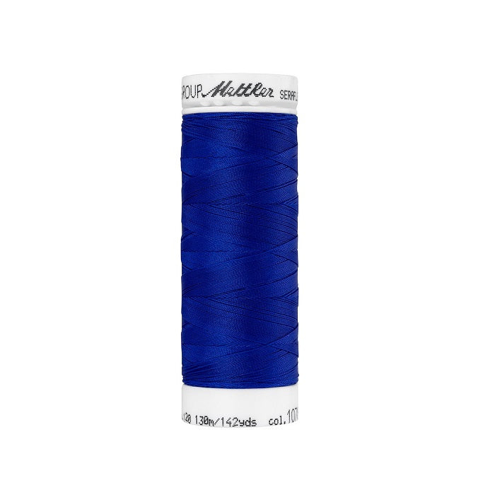 Spool of royal blue thread with Mettler Seraflex branding.