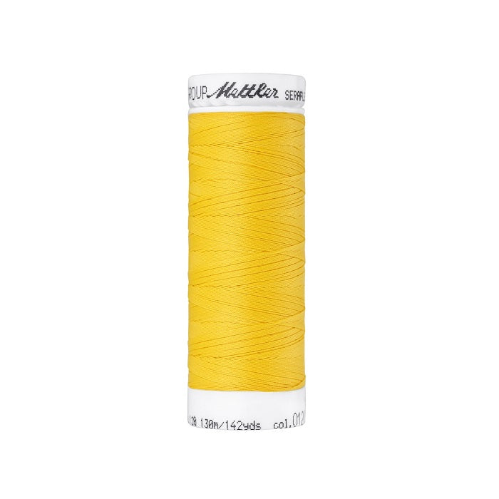 Spool of bright yellow thread with Mettler Seraflex branding.