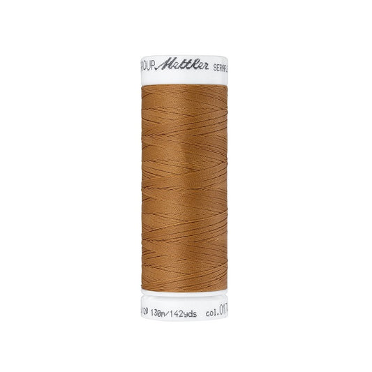 Spool of warm brown thread with Mettler Seraflex branding.