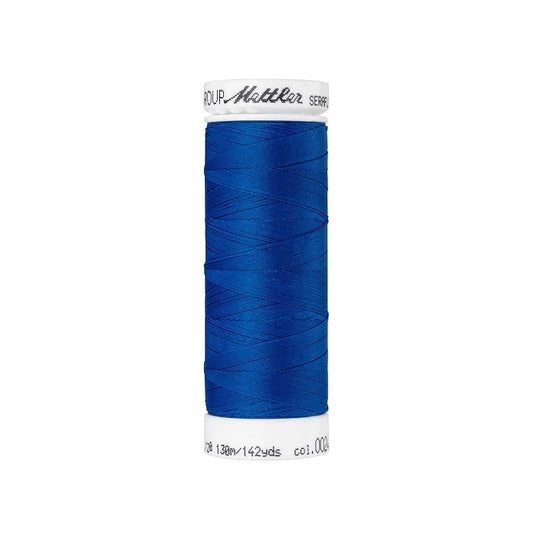Spool of bright royal blue thread with Mettler Seraflex branding.