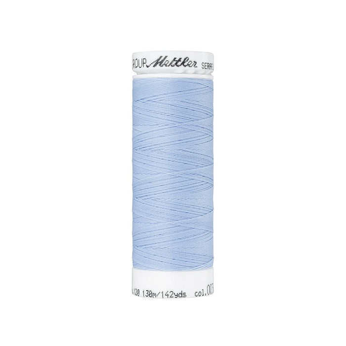 Spool of pale blue thread with Mettler Seraflex branding.