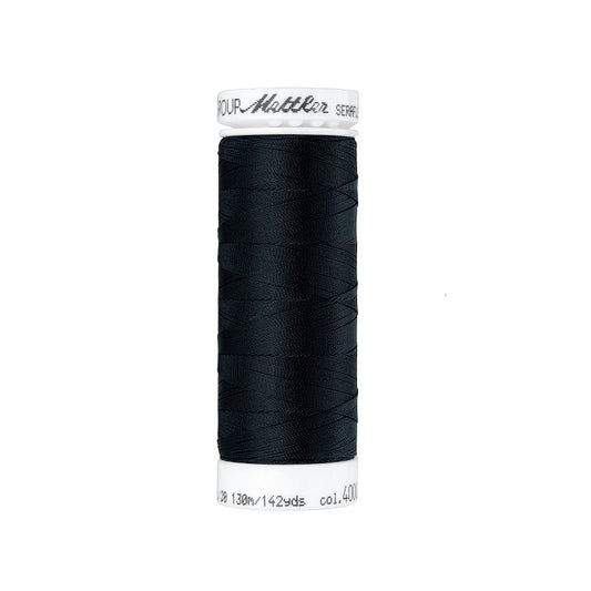 Spool of black thread with Mettler Seraflex branding.