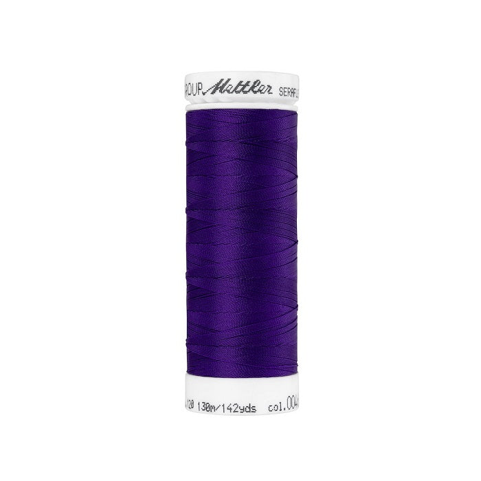 Spool of purple thread with Mettler Seraflex branding.
