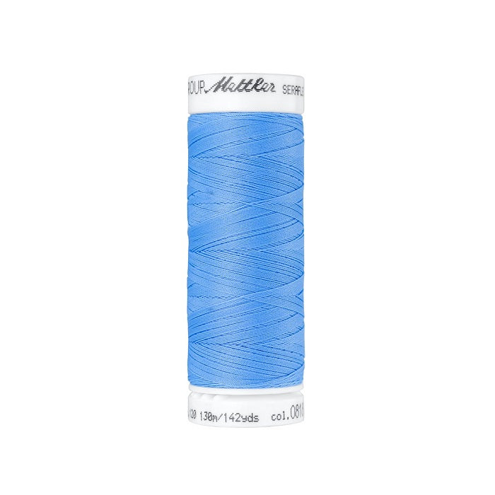 Spool of bright blue thread with Mettler Seraflex branding.