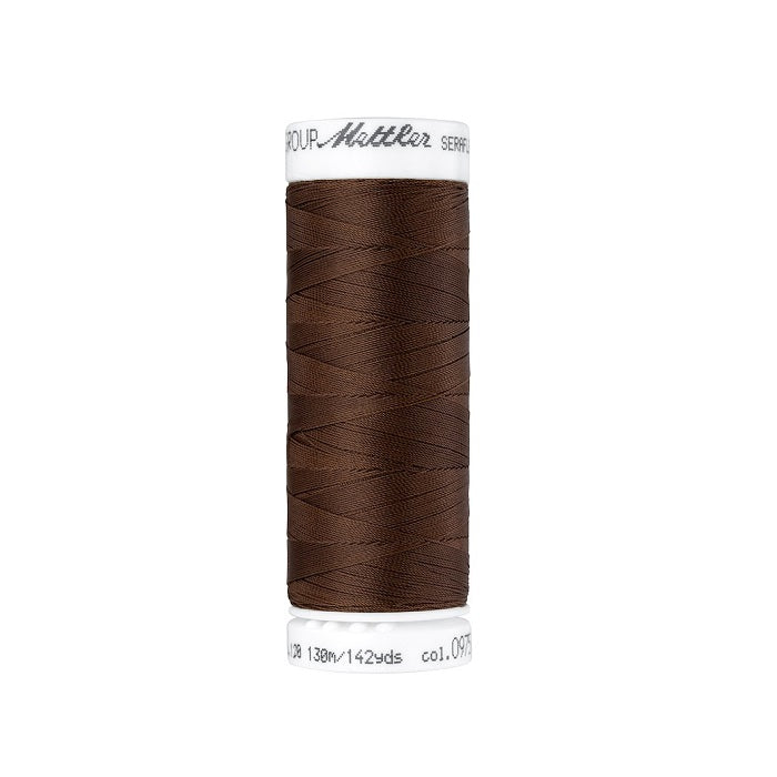 Spool of dark brown thread with Mettler Seraflex branding.