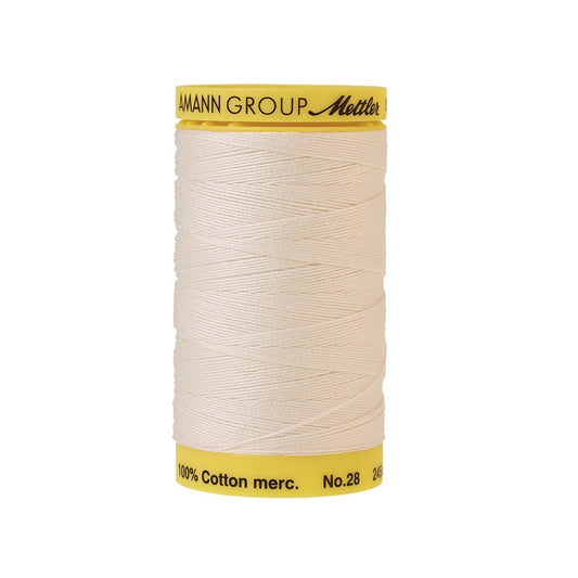 Cream thread with Mettler Cotton 28 branding.