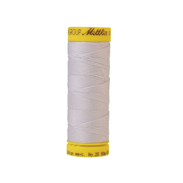 White thread with Mettler Cotton 28 branding.