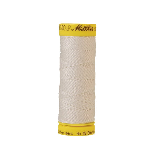 Ivory thread with Mettler Cotton 28 branding.