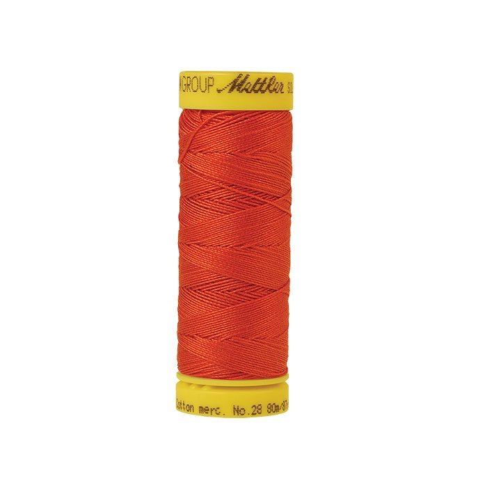 Bright red thread with Mettler Cotton 28 branding.