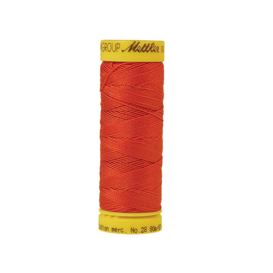 Bright red thread with Mettler Cotton 28 branding.