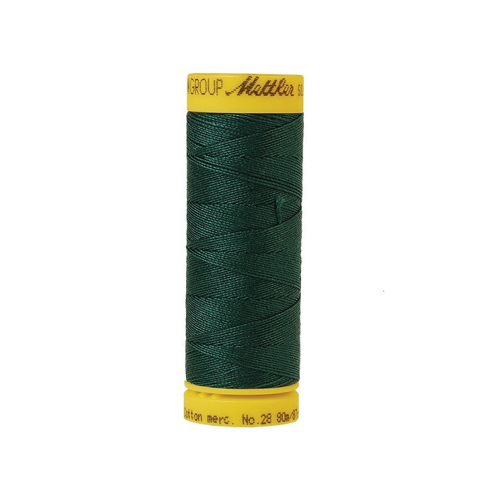 Dark green thread with Mettler Cotton 28 branding.