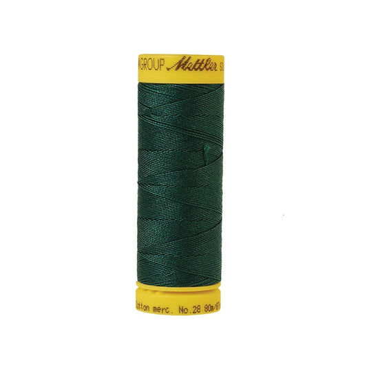 Dark green thread with Mettler Cotton 28 branding.