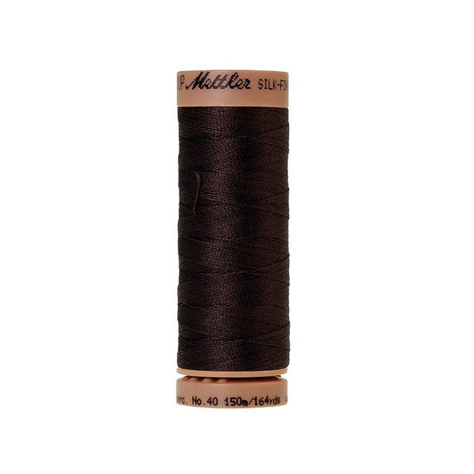 Very dark brown thread with Mettler Cotton 40 branding.