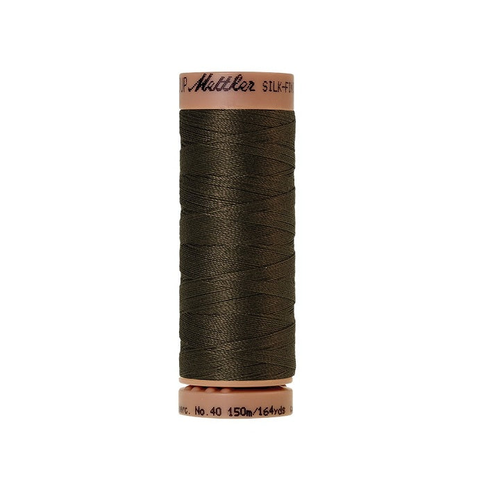 Olive green thread with Mettler Cotton 40 branding.