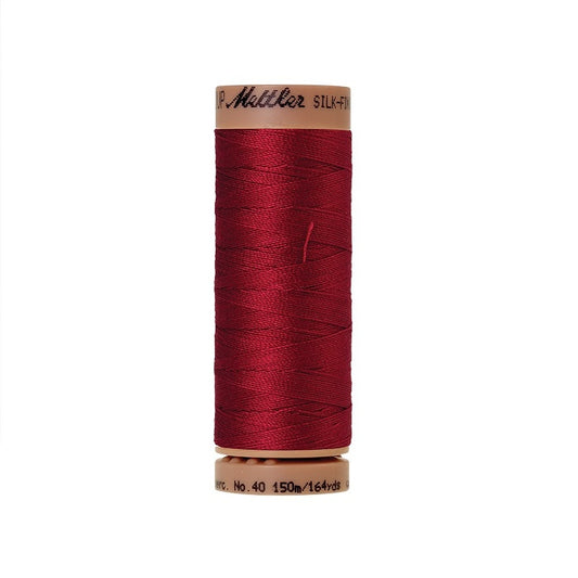 Dark red thread with Mettler Cotton 40 branding.