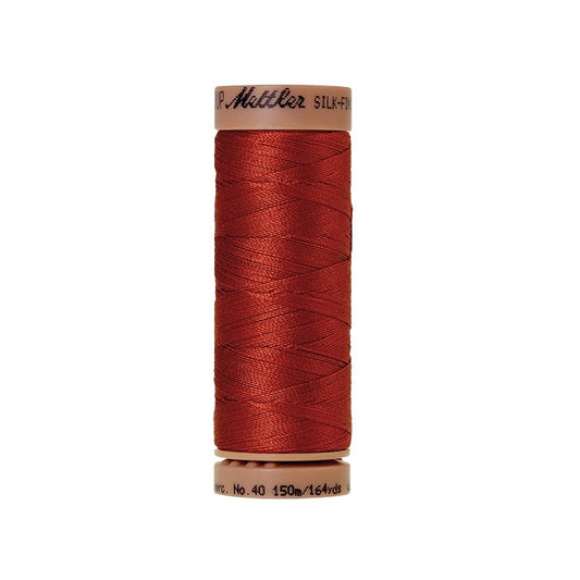 Red thread with Mettler Cotton 40 branding.