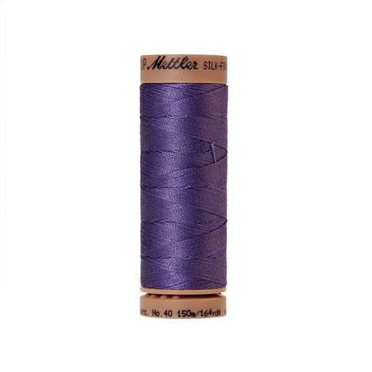 Purple thread with Mettler Cotton 40 branding.