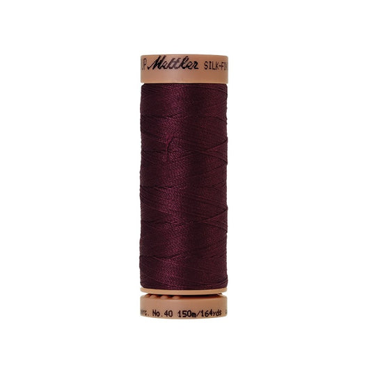 Burgundy thread with Mettler Cotton 40 branding.