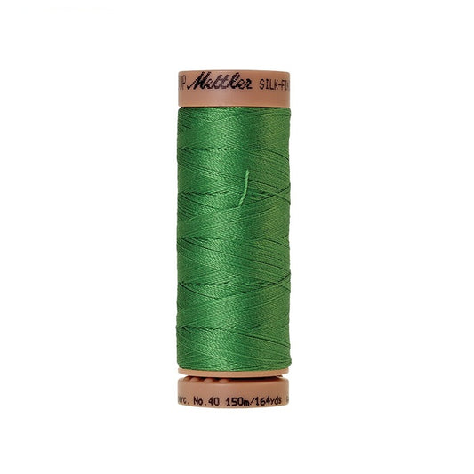 Green thread with Mettler Cotton 40 branding.