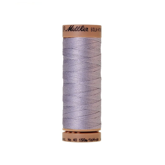 Light blue thread with Mettler Cotton 40 branding.