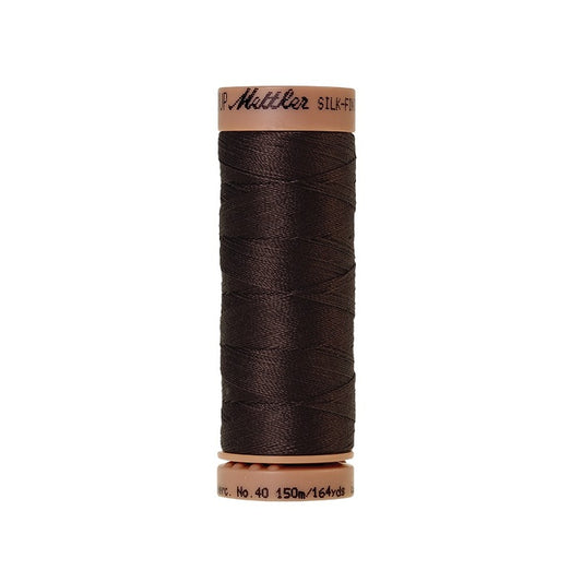 Very dark brown thread with Mettler Cotton 40 branding.